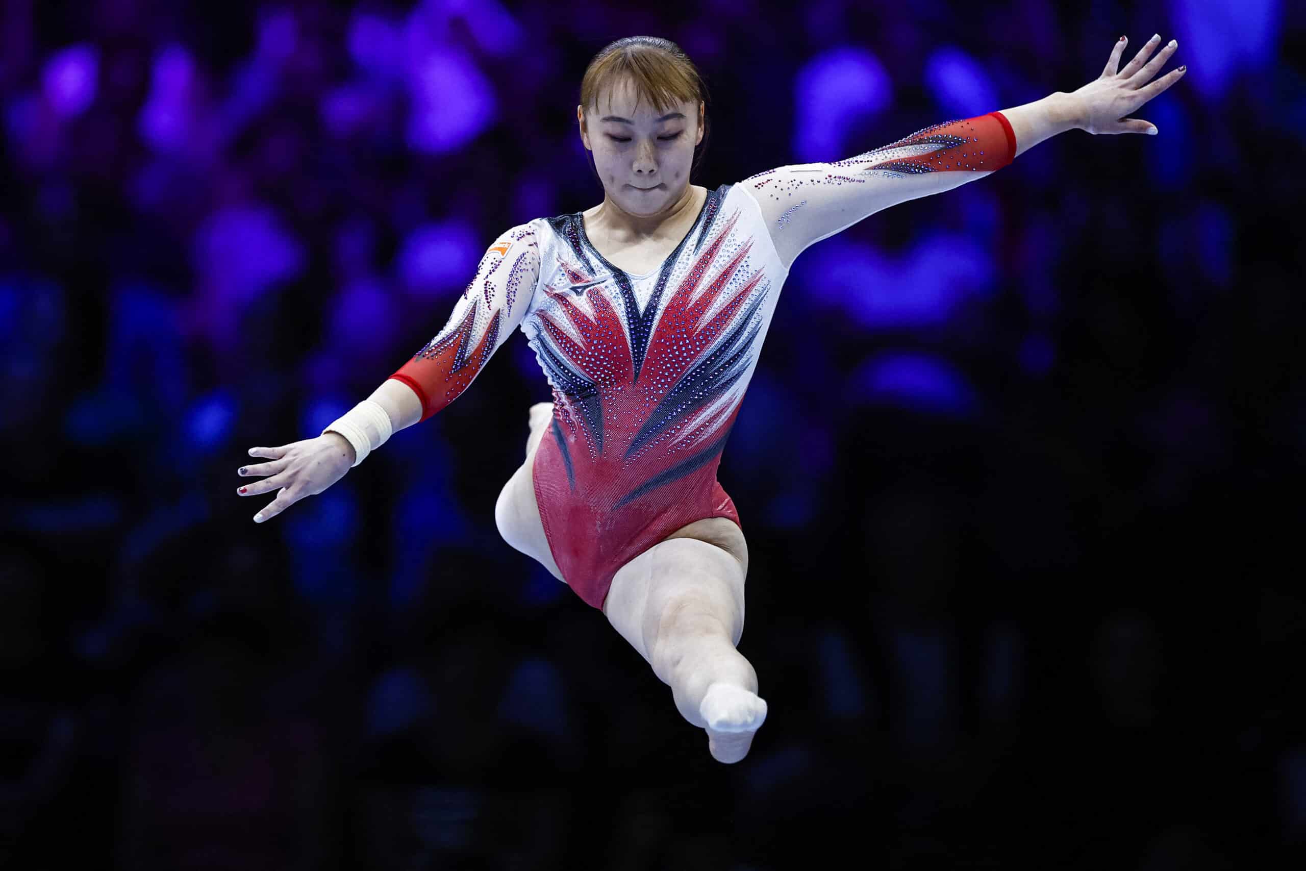 Japan's Shoko Miyata competes on the balance beam during the women's qualifying session the 52nd FIG Artistic Gymnastics World Championships, in Antwerp, northern Belgium, on October 2, 2023. (Photo by KENZO TRIBOUILLARD / AFP)