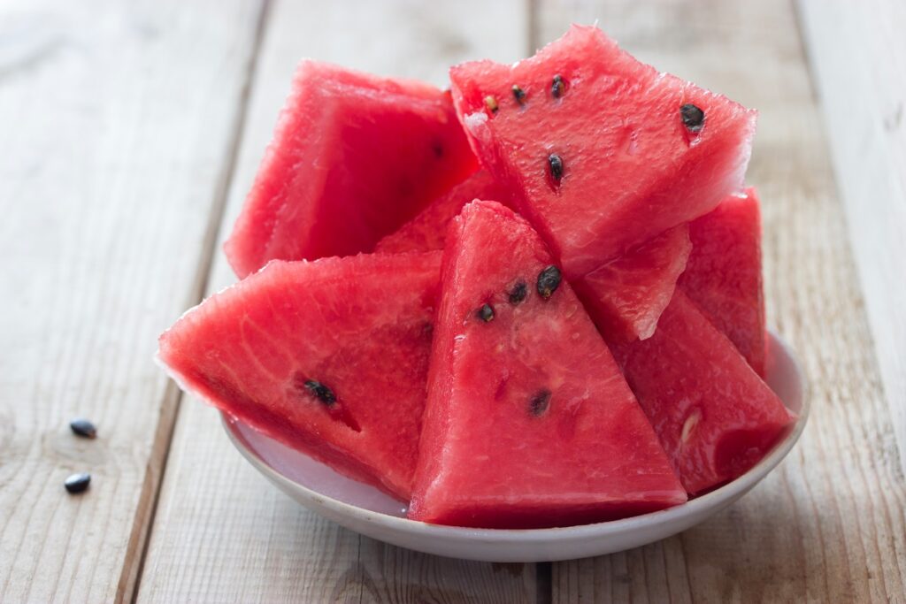 Ripe,Juicy,Red,Watermelon,Sliced,Pieces,On,The,Table.