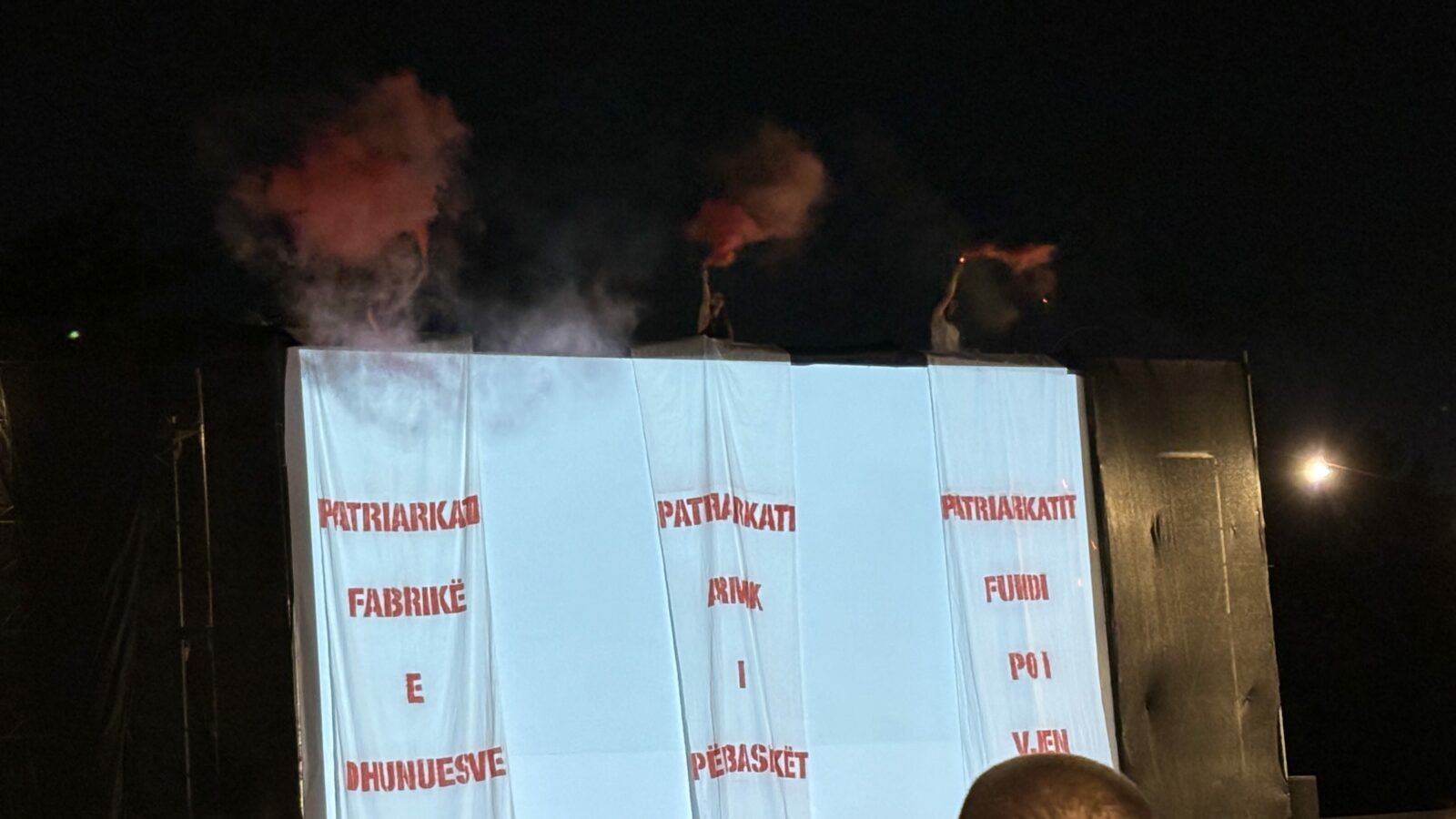 Posters at the opening of Anibar International Animation Festival read: “‘Patriarkati: Fabrikë e Dhunuesve (The Patriarchy: a Factory of Abusers)’; ‘Patriarkati: Armik i Përbashkët (The Patriarchy: Mutual Enemy)’; ‘Patriarkati: Fundi po i vjen (Patriarchy: Its end is coming)’." July 15, 2024. Photo: BIRN